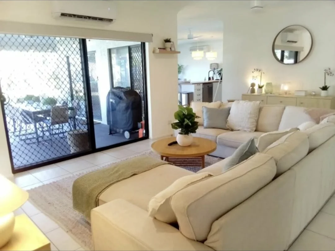 Clean open-plan living room in a Cairns home