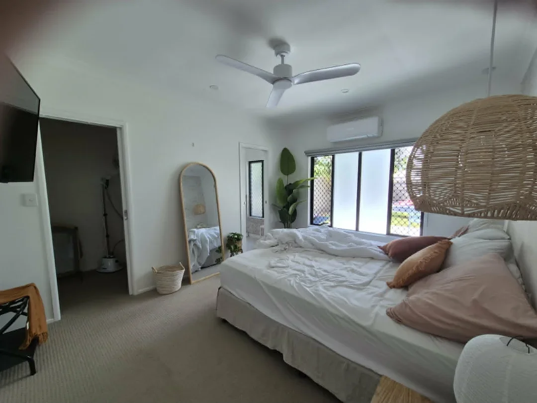 Bright bedroom in a Palm Cove short-stay property